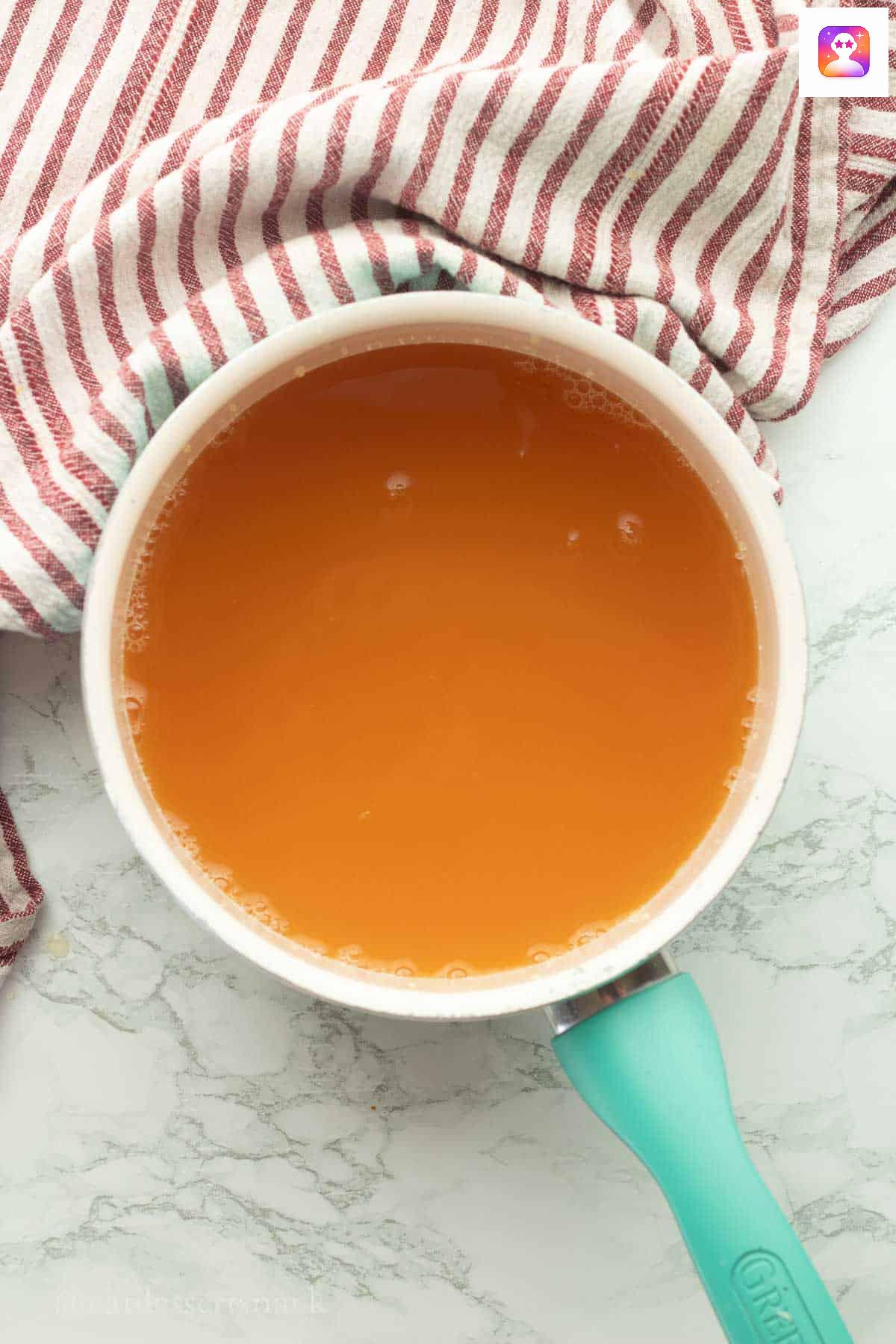 Apple cider in pan.